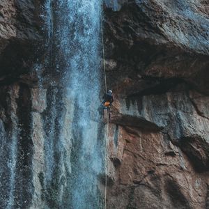 Preview wallpaper waterfall, water, rock, rock climber