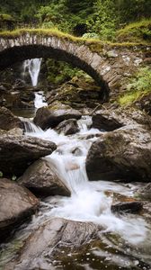 Preview wallpaper waterfall, water, stones, bridge, nature