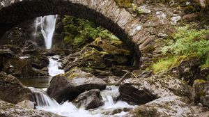 Preview wallpaper waterfall, water, stones, bridge, nature