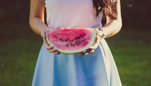 Preview wallpaper watermelon, girl, hands, dress