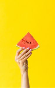 Preview wallpaper watermelon, hand, yellow, red, berry, fruit