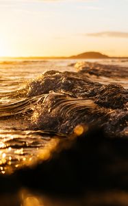 Preview wallpaper wave, sea, glare, ripples, sunset
