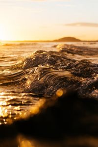 Preview wallpaper wave, sea, glare, ripples, sunset