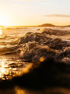 Preview wallpaper wave, sea, glare, ripples, sunset