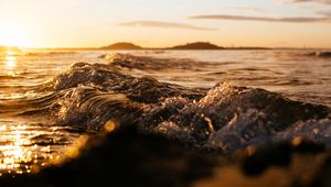 Preview wallpaper wave, sea, glare, ripples, sunset