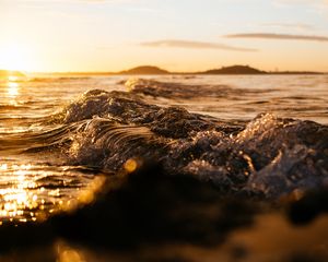 Preview wallpaper wave, sea, glare, ripples, sunset