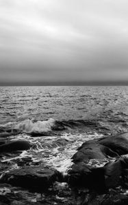 Preview wallpaper waves, stones, sea, black and white, nature, horizon