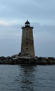 Preview wallpaper whaleback lighthouse, lighthouse, stones, sea, clouds, usa