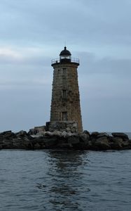 Preview wallpaper whaleback lighthouse, lighthouse, stones, sea, clouds, usa