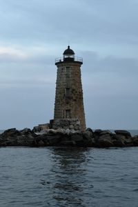 Preview wallpaper whaleback lighthouse, lighthouse, stones, sea, clouds, usa