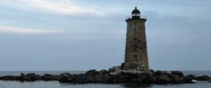 Preview wallpaper whaleback lighthouse, lighthouse, stones, sea, clouds, usa