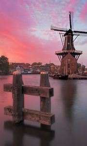 Preview wallpaper wind mill, buildings, river, sunset