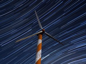 Preview wallpaper wind turbine, structure, starry sky, long exposure, glow, night