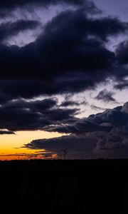 Preview wallpaper windmill, clouds, night, overcast, horizon