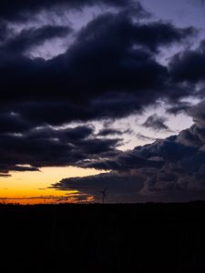 Preview wallpaper windmill, clouds, night, overcast, horizon