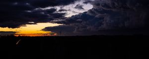 Preview wallpaper windmill, clouds, night, overcast, horizon