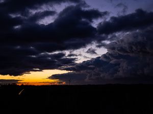 Preview wallpaper windmill, clouds, night, overcast, horizon