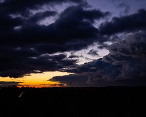 Preview wallpaper windmill, clouds, night, overcast, horizon