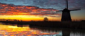 Preview wallpaper windmill, dark, dusk, river, nature