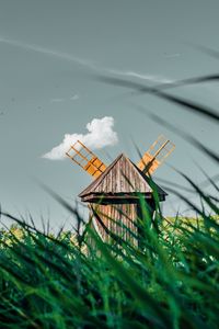 Preview wallpaper windmill, old, wooden, grass, field