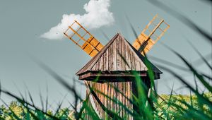 Preview wallpaper windmill, old, wooden, grass, field