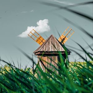 Preview wallpaper windmill, old, wooden, grass, field