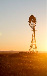 Preview wallpaper windmill, silhouette, field, sunset