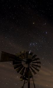 Preview wallpaper windmill, structure, starry sky, night