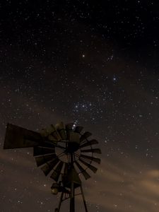Preview wallpaper windmill, structure, starry sky, night