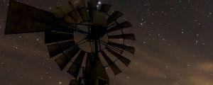 Preview wallpaper windmill, structure, starry sky, night