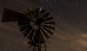 Preview wallpaper windmill, structure, starry sky, night