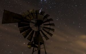 Preview wallpaper windmill, structure, starry sky, night