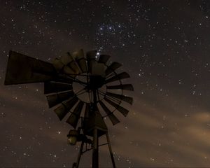 Preview wallpaper windmill, structure, starry sky, night