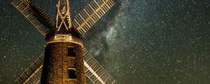 Preview wallpaper windmill, tower, building, night, starry sky, stars