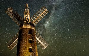 Preview wallpaper windmill, tower, building, night, starry sky, stars