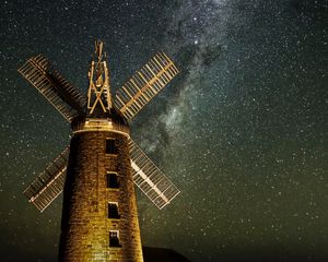 Preview wallpaper windmill, tower, building, night, starry sky, stars