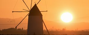 Preview wallpaper windmill, tower, fog, sunset