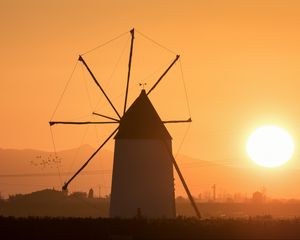 Preview wallpaper windmill, tower, fog, sunset