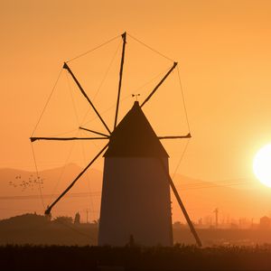 Preview wallpaper windmill, tower, fog, sunset