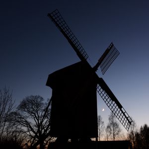 Preview wallpaper windmill, trees, silhouettes, night, sky, dark