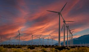 Preview wallpaper windmills, energy, clouds