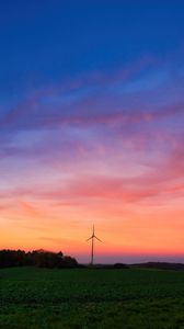 Preview wallpaper windmills, field, grass, twilight, dark