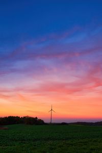 Preview wallpaper windmills, field, grass, twilight, dark