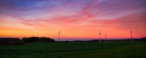 Preview wallpaper windmills, field, grass, twilight, dark