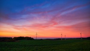 Preview wallpaper windmills, field, grass, twilight, dark