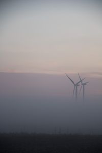 Preview wallpaper windmills, fog, field, minimalism