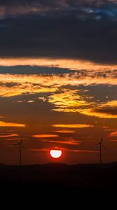 Preview wallpaper windmills, sunset, sky