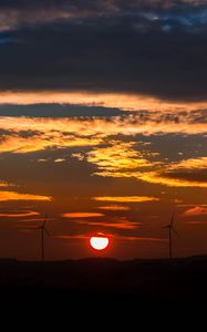 Preview wallpaper windmills, sunset, sky