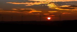 Preview wallpaper windmills, sunset, sky