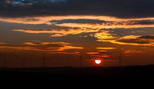 Preview wallpaper windmills, sunset, sky